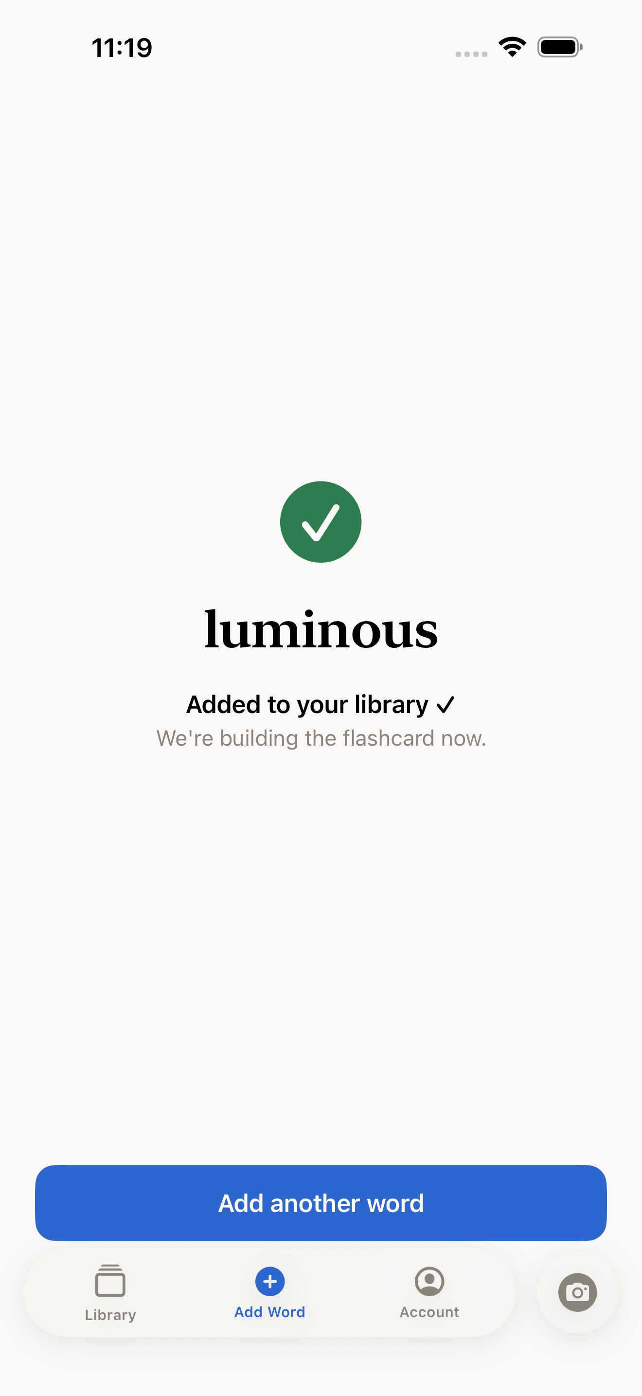 Build 12: confirmation screen — added to your library, flashcard building in background